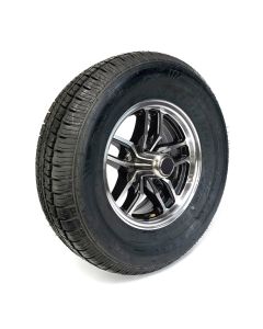 205/75R14 8 ply LRD 2040 lbs radial Castle Rock tire and 14" 5 holes black aluminum Osprey rim