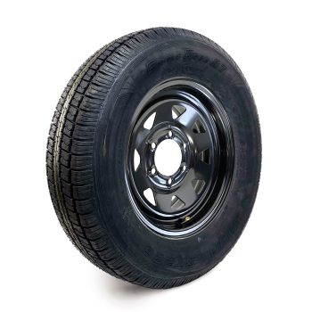 205/75R15 6 ply LRC 1820 lbs radial Castle Rock tire and 15" 6 holes black rally rim