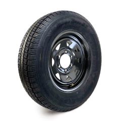 205/75R15 6 ply LRC 1820 lbs radial Castle Rock tire and 15" 6 holes black rally rim